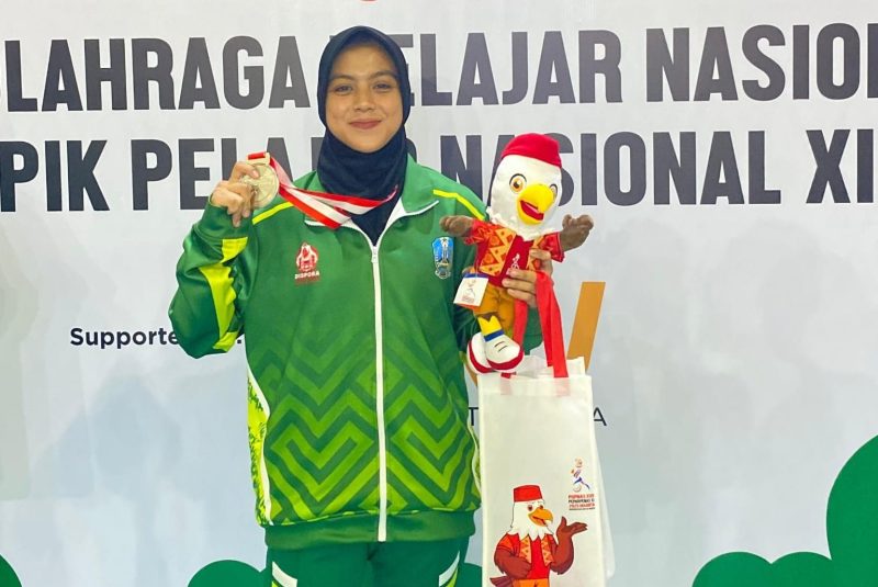 Atlet Silat Sumenep Bersinar: Fethum Muxin Cetak Prestasi Nasional dengan Medali Perak Popnas